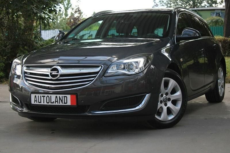 Grafitowy (metalik) Używany 2013 Opel Insignia Kombi | 33 333 zł - Obraz 1/4