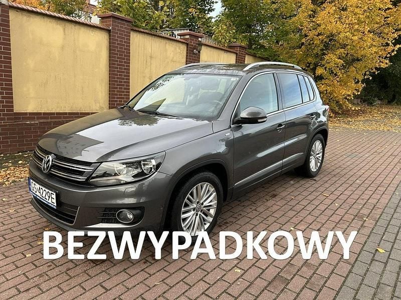 Szary (metalik) Używany 2014 VW Tiguan SUV | 44 950 zł (Uczciwa cena) - Obraz 1/4