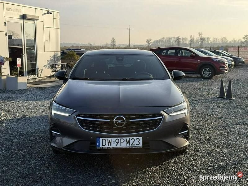 Szary Używany 2022 Opel Insignia Kombi | 74 900 zł (Uczciwa cena) - Obraz 1/4