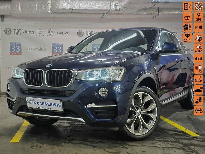 Niebieski ciemny (metalik) Używany 2017 BMW X4 SUV | 89 800 zł - Obraz 1/4
