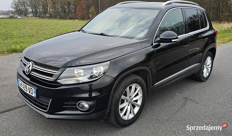Czarny Używany 2016 VW Tiguan LOUNGE SUV | 38 999 zł - Obraz 1/4