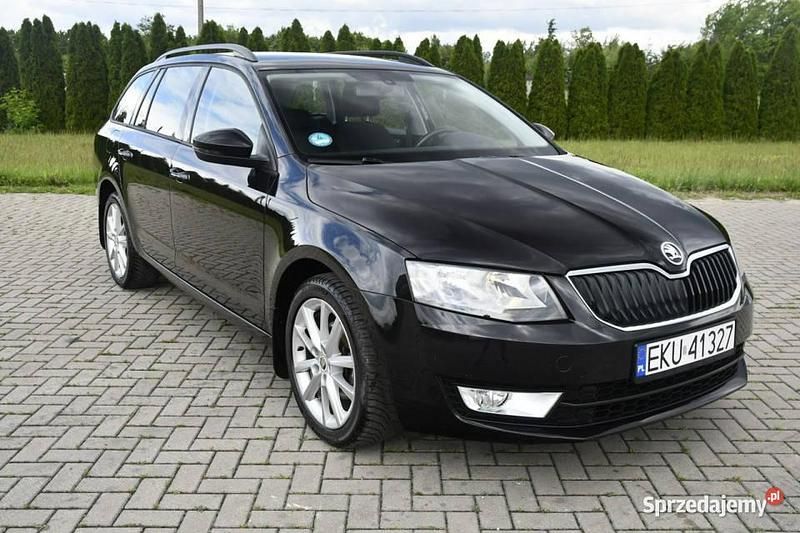 Czarny Używany 2013 Skoda Octavia Kombi | 24 900 zł (Dobra cena) - Obraz 1/4