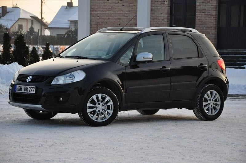 Używany Suzuki SX4 120 KM (88 kW) 2014 Czarny (metalik) Sedan/Limuzyna