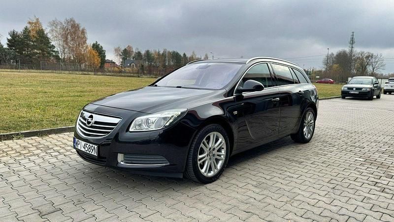 Używany Opel Insignia 130 KM (95 kW) 2010 Czarny (metalik) Kombi