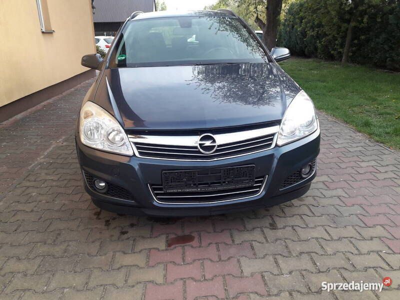 Szary Używany 2009 Opel Astra Kombi | 12 900 zł (Uczciwa cena) - Obraz 1/4
