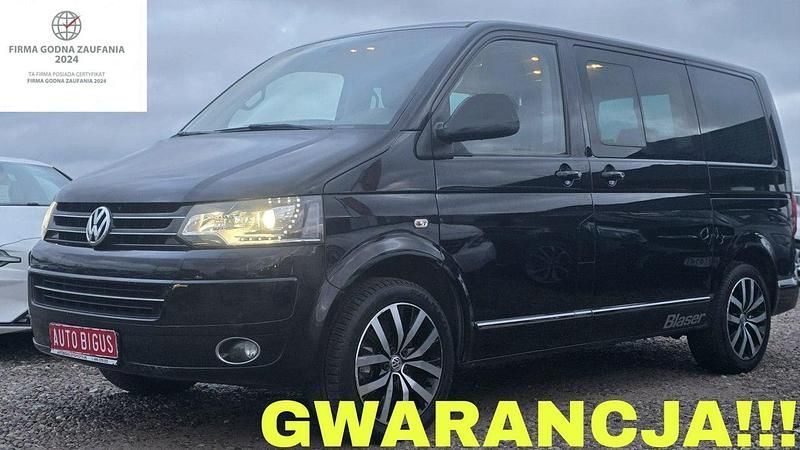 Czerwony ciemny (metalik, perła) Używany 2015 VW Multivan Highline Van | 97 700 zł (Uczciwa cena) - Obraz 1/4