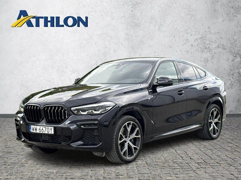 Niebieski ciemny (metalik) Używany 2022 BMW X6 SUV | 307 400 zł - Obraz 1/4
