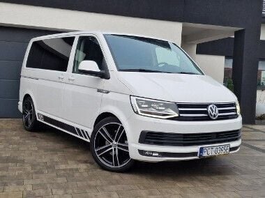 Biały Używany 2016 VW Multivan Van | 134 000 zł (Uczciwa cena) - Obraz 1/4