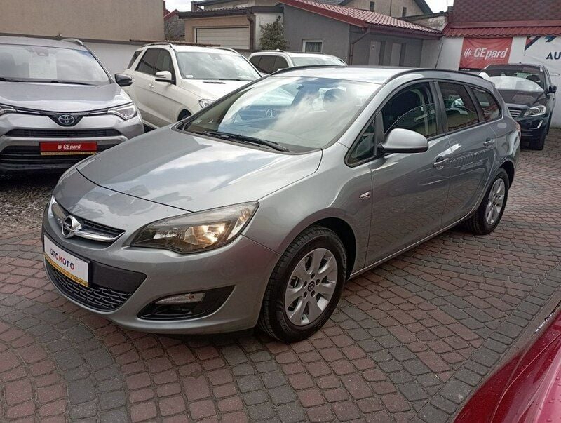 Szary (metalik) Używany 2014 Opel Astra Sedan/Limuzyna | 26 900 zł (Dość drogi) - Obraz 1/4