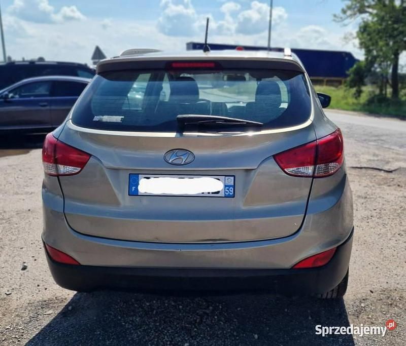 Złoty Używany 2010 Hyundai ix35 SUV | 12 999 zł - Obraz 1/4