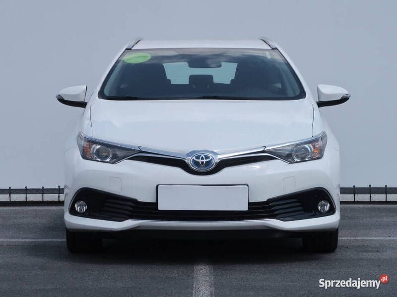Biały Używany 2015 Toyota Auris Hybrid Kombi | 47 999 zł (Super Cena) - Obraz 1/4