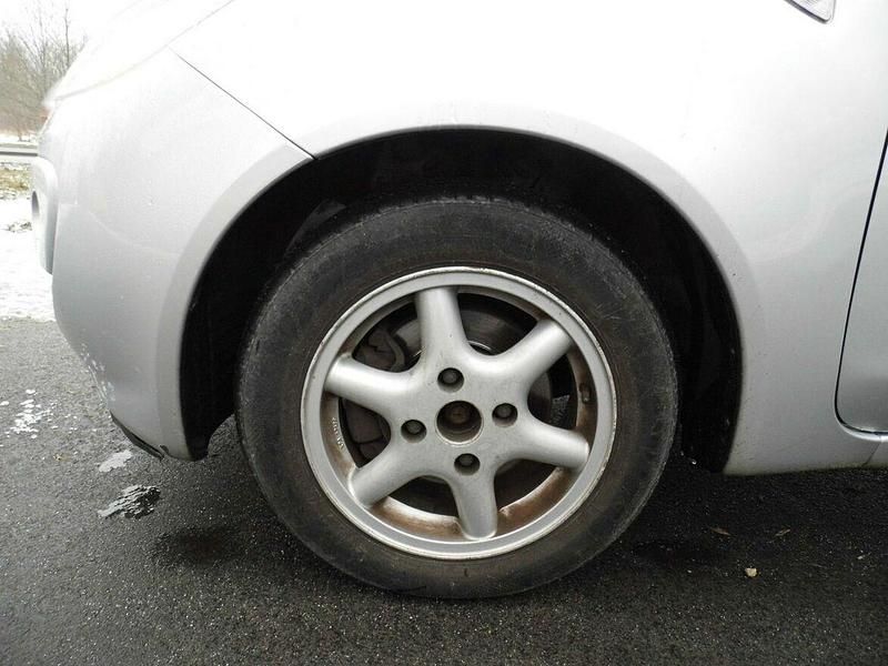 Używany Mitsubishi Colt 2006 Srebrny Hatchback