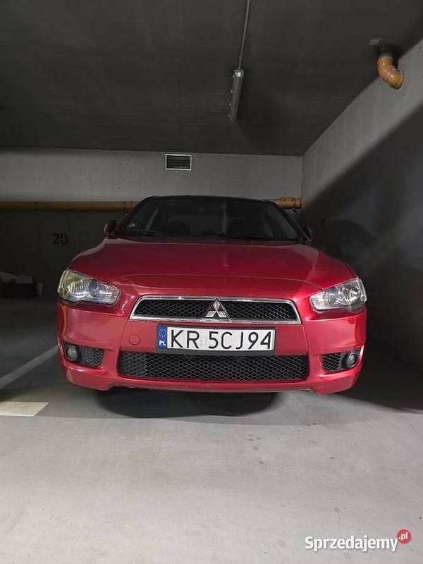 Czerwony Używany 2009 Mitsubishi Lancer Sedan/Limuzyna | 21 900 zł (Uczciwa cena) - Obraz 1/4
