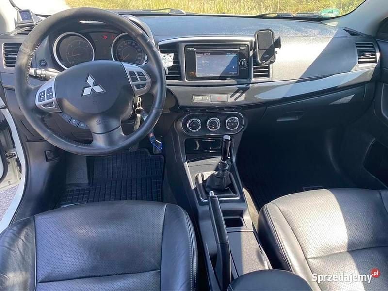 Biały Używany 2013 Mitsubishi Lancer Hatchback | 28 500 zł - Obraz 1/4