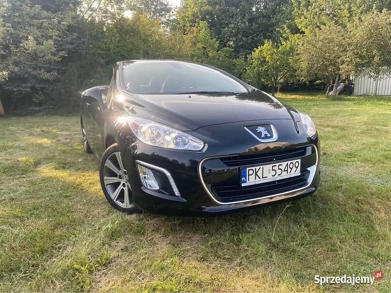Czarny Używany 2014 Peugeot 308 CC Kabriolet | 28 600 zł - Obraz 1/4