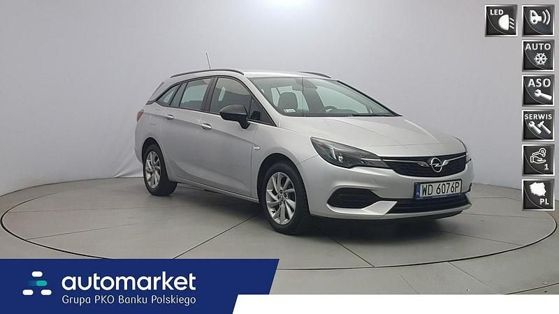 Srebrny Używany 2021 Opel Astra Edition Kombi | 48 850 zł (Uczciwa cena) - Obraz 1/4