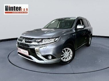 Szary Używany 2016 Mitsubishi Outlander P-HEV SUV | 95 900 zł - Obraz 1/4