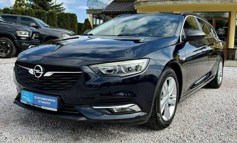 Granatowy Używany 2019 Opel Insignia Kombi | 53 900 zł (Uczciwa cena) - Obraz 1/4
