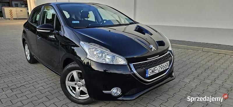 Brązowy Używany 2014 Peugeot 208 Active Hatchback | 20 900 zł (Uczciwa cena) - Obraz 1/4