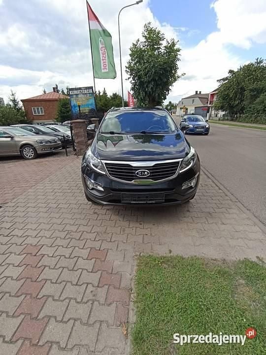 Czarny Używany 2011 Kia Sportage SUV | 31 700 zł (Uczciwa cena) - Obraz 1/4