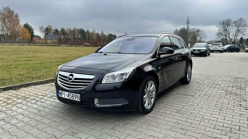 Używany Opel Insignia 130 KM (95 kW) 2010 Czarny (metalik) Kombi