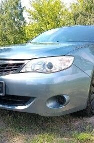 Używany Subaru Impreza 107 KM (78 kW) 2009 Niebieski Hatchback