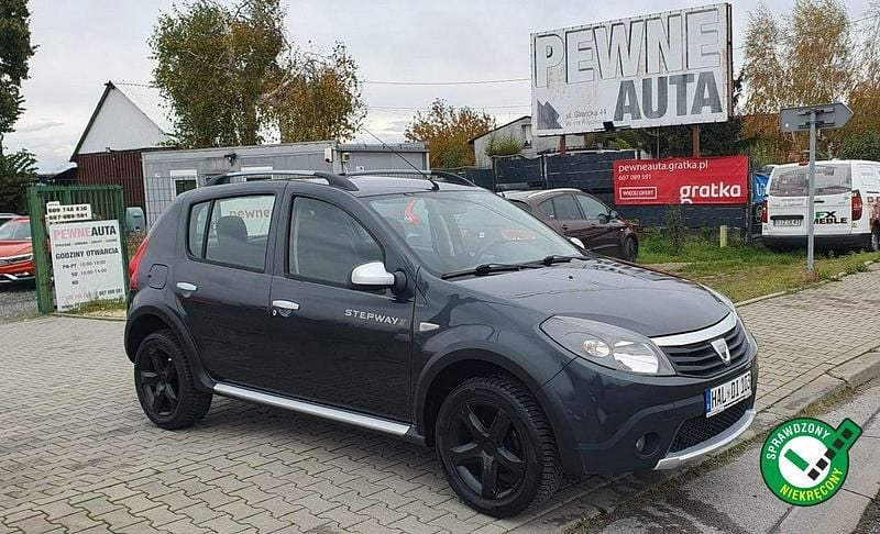 Szary (metalik) Używany 2011 Dacia Sandero Stepway Hatchback | 18 900 zł (Uczciwa cena) - Obraz 1/4
