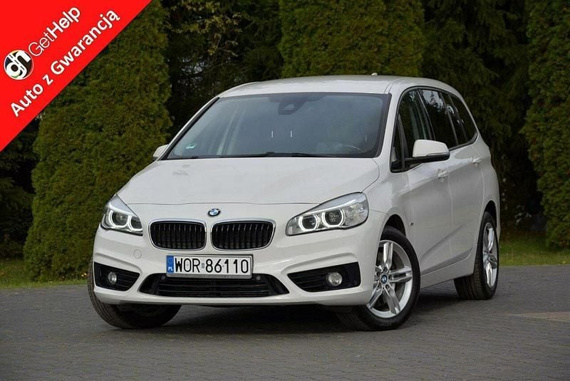 Biały Używany 2015 BMW 220 Minivan | 54 900 zł - Obraz 1/4