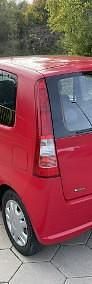 Używany Daihatsu Cuore 58 KM (42 kW) 2006 Czerwony Hatchback
