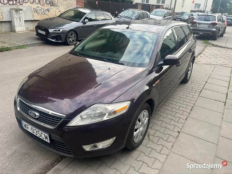 Używany Ford Mondeo 125 KM (91 kW) 2010 Wiśniowy Kombi