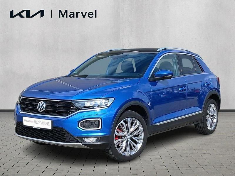 Niebieski ciemny (metalik) Używany 2020 VW T-Roc SUV | 89 900 zł (Uczciwa cena) - Obraz 1/4