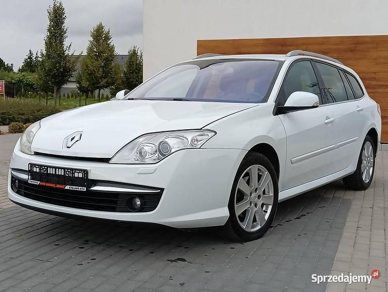 Biały Używany 2009 Renault Laguna III Kombi | 22 900 zł (Uczciwa cena) - Obraz 1/4