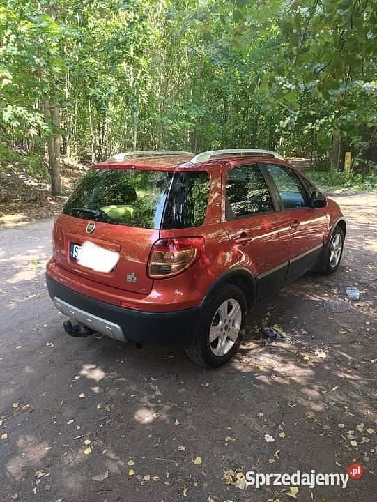 Czerwony Używany 2009 Fiat Sedici SUV | 15 500 zł (Dobra cena) - Obraz 1/4