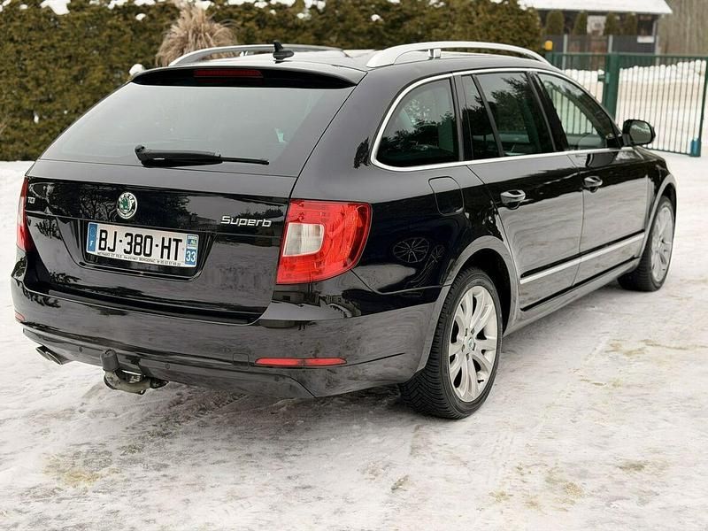 Używany Skoda Superb 170 KM (125 kW) 2011 Czarny (metalik) Kombi