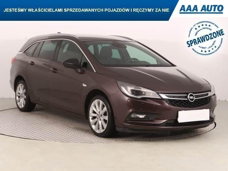 Brązowy Używany 2016 Opel Astra | 36 999 zł (Uczciwa cena) - Obraz 1/4