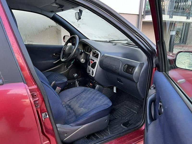 Używany Fiat Palio 80 KM (58 kW) 2002 Czerwony Kombi