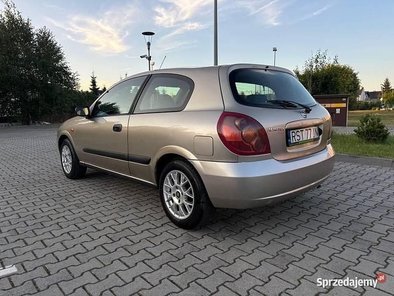 Używany Nissan Almera 2003 Złoty Hatchback