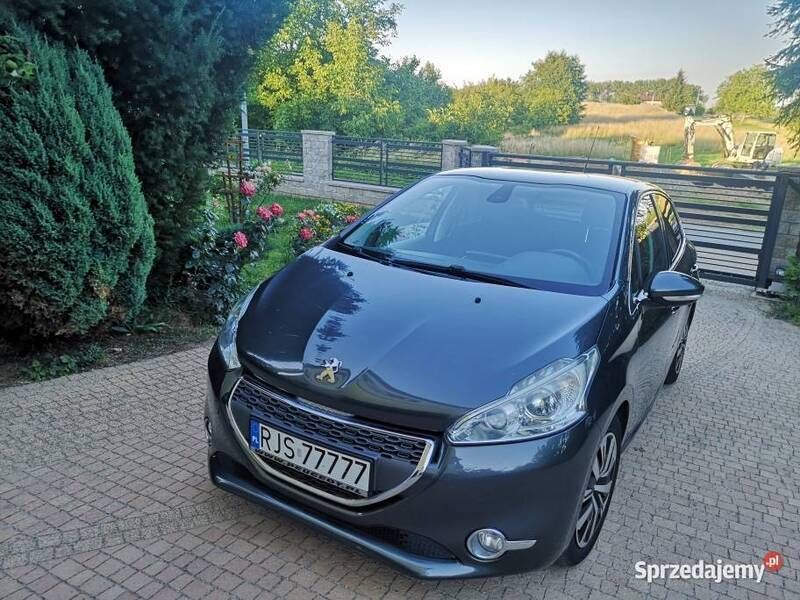 Szary Używany 2012 Peugeot 208 Hatchback | 25 600 zł (Drogi) - Obraz 1/4