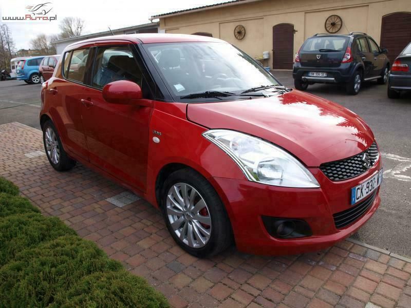 Używany Suzuki Swift Comfort 90 KM (66 kW) 2013 Czerwony ciemny (metalik) Hatchback