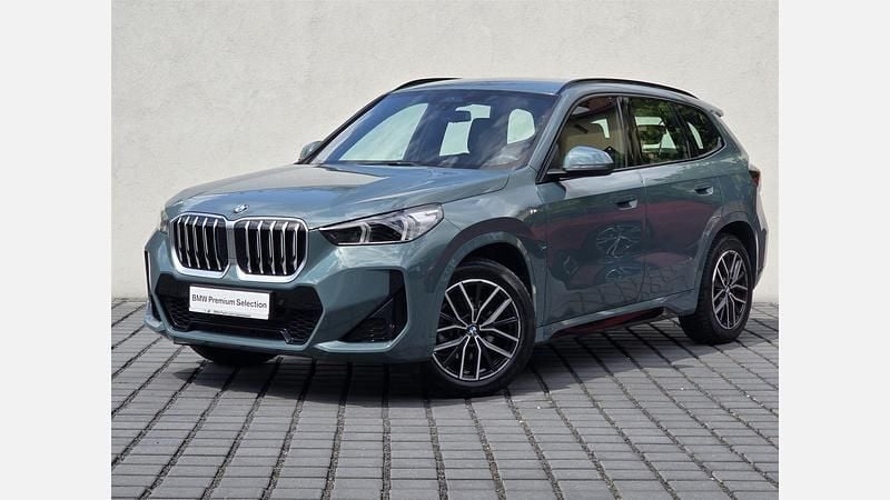 Zielony cape york metalizowany Używany 2024 BMW X1 Luxury Line SUV | 174 900 zł (Uczciwa cena) - Obraz 1/3