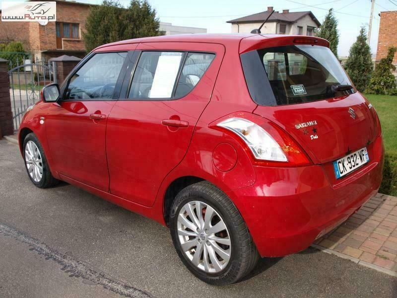 Używany Suzuki Swift Comfort 90 KM (66 kW) 2013 Czerwony ciemny (metalik) Hatchback
