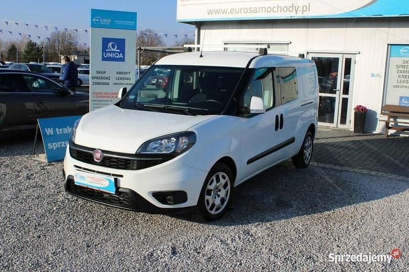 Biały Używany 2020 Fiat Doblò Dynamic Minivan | 53 499 zł (Uczciwa cena) - Obraz 1/4