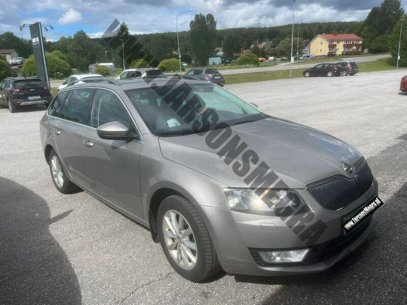 Używany Skoda Octavia 105 KM (77 kW) 2014 Brązowy Kombi
