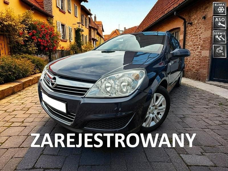 Szary Używany 2008 Opel Astra Kombi | 11 200 zł (Uczciwa cena) - Obraz 1/4