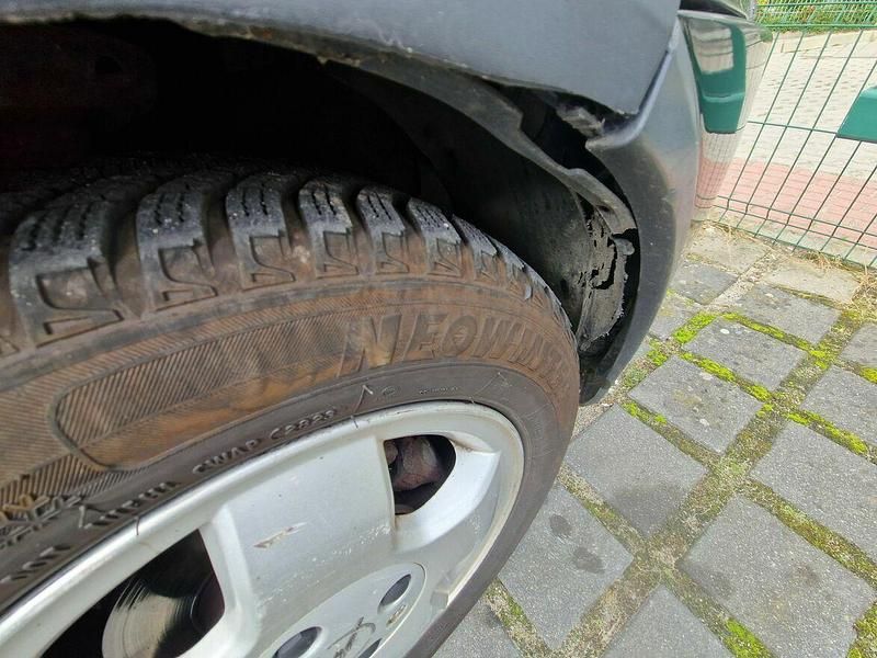 Używany Opel Corsa 75 KM (55 kW) 2003 Czarny Hatchback