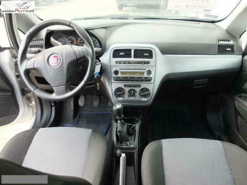 Używany Fiat Grande Punto 77 KM (56 kW) 2011 Srebrny (metalik) Hatchback