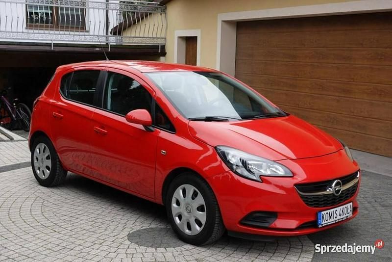 Czerwony (metalik) Używany 2015 Opel Corsa Hatchback | 22 900 zł (Dobra cena) - Obraz 1/4