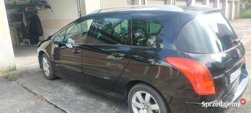 Używany Peugeot 308 SW 2011 Czarny Kombi