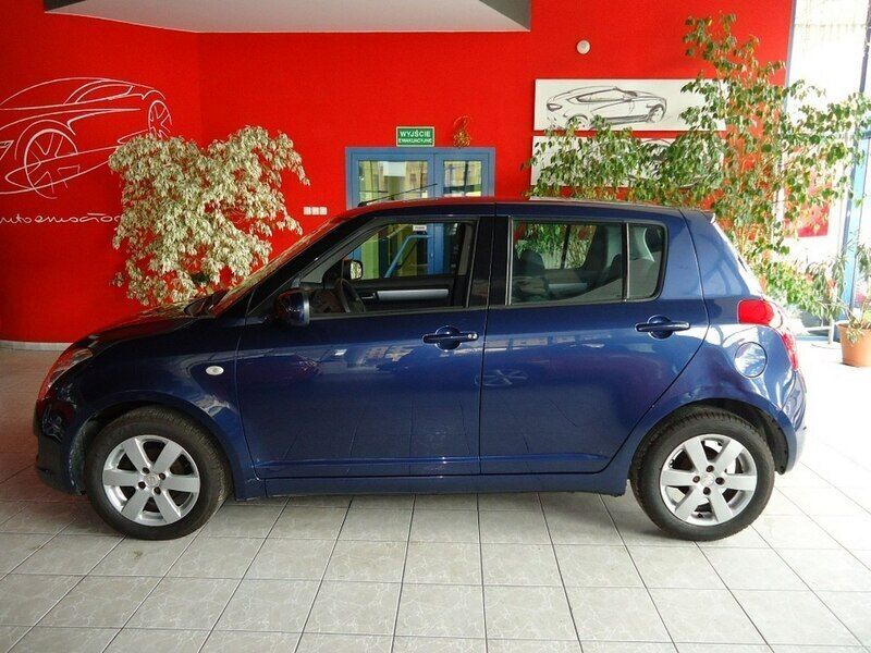 Niebieski metalik (metallic) Używany 2007 Suzuki Swift Hatchback | 13 900 zł (Uczciwa cena) - Obraz 1/4