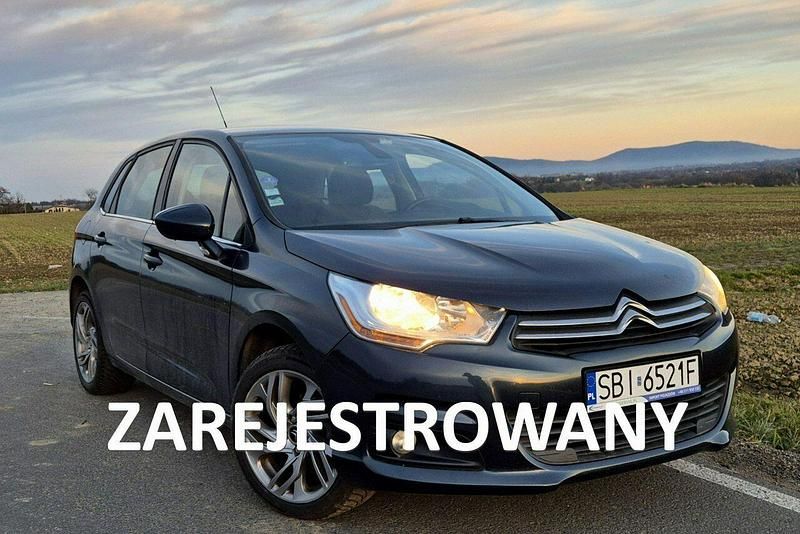 Niebieski (metalik, perła) Używany 2014 Citroën C4 Hatchback | 18 800 zł - Obraz 1/4